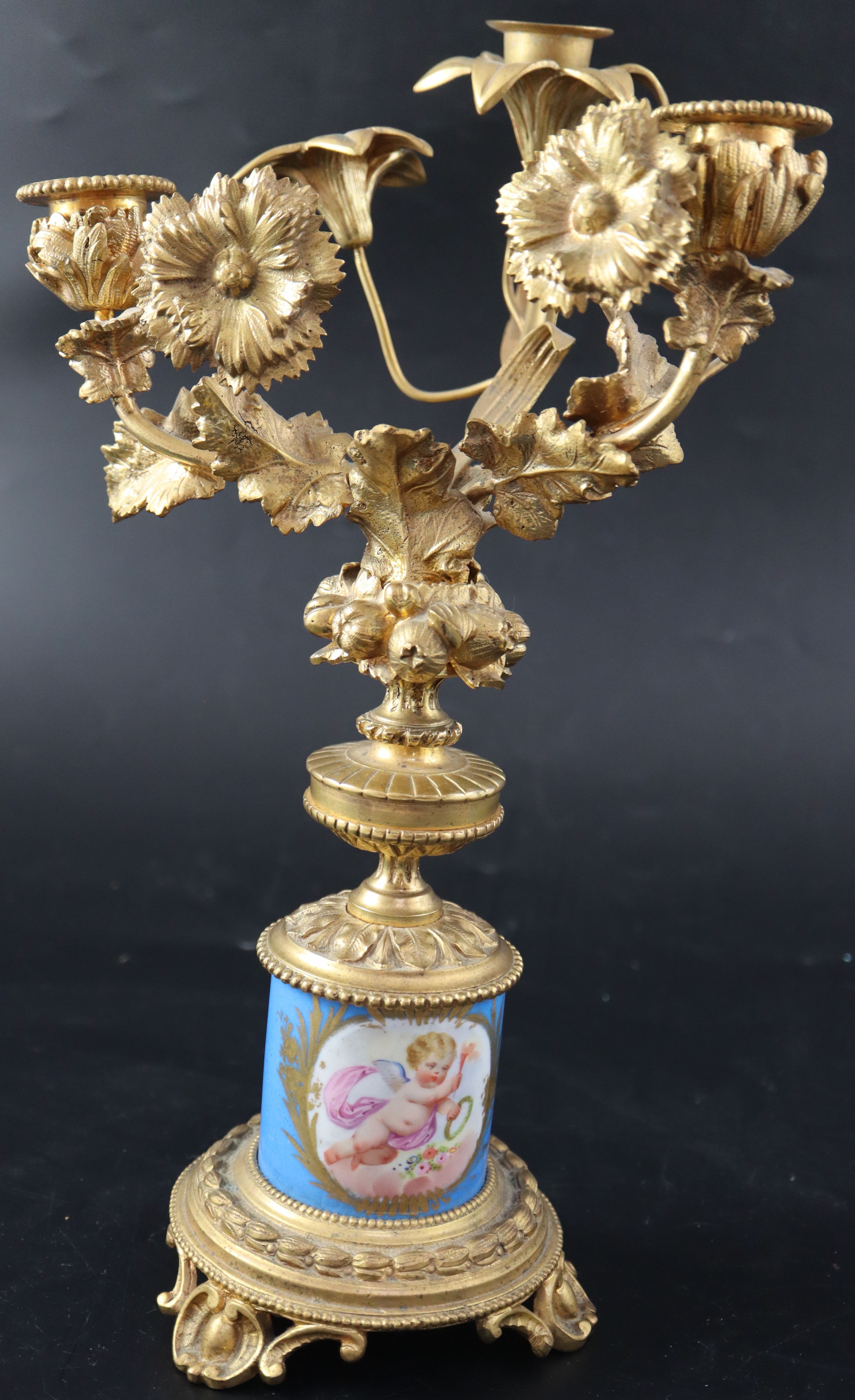 A pair of 19th century French ormolu and Sevres style porcelain three light candelabra, height 32cm